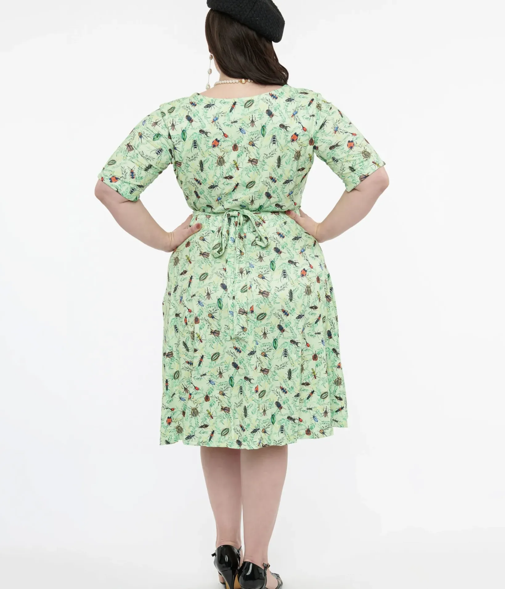 Unique Vintage Fit & Flare|Wrap Dresses>Dolly & Dotty 1950s Mint Green Nothing But Bugs Print Matilda Wrap Dress