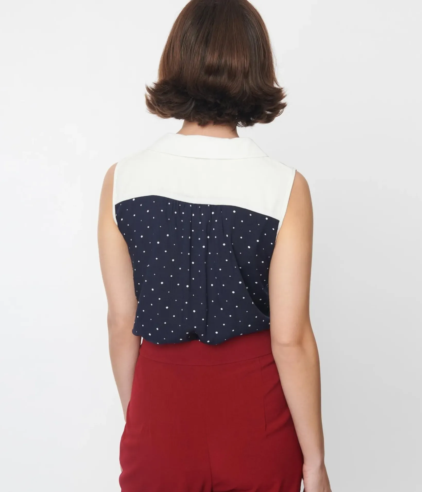 Unique Vintage Blouses>Navy & Ivory Pin Dot Bow Top