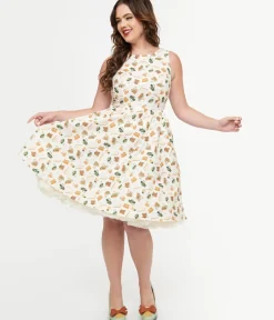 Unique Vintage Swing|Pocket Dresses>Retrolicious 1950s Cream Book & Tea Print Cotton Swing Dress