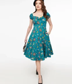 Unique Vintage Swing|Pocket Dresses>1950s Teal Dart Board Keep Em Flying Cotton Swing Dress