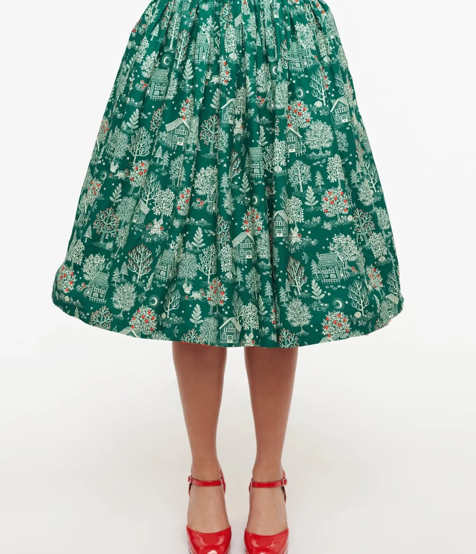 Unique Vintage Skirts>1950s Green Winter Print Gellar Swing Skirt