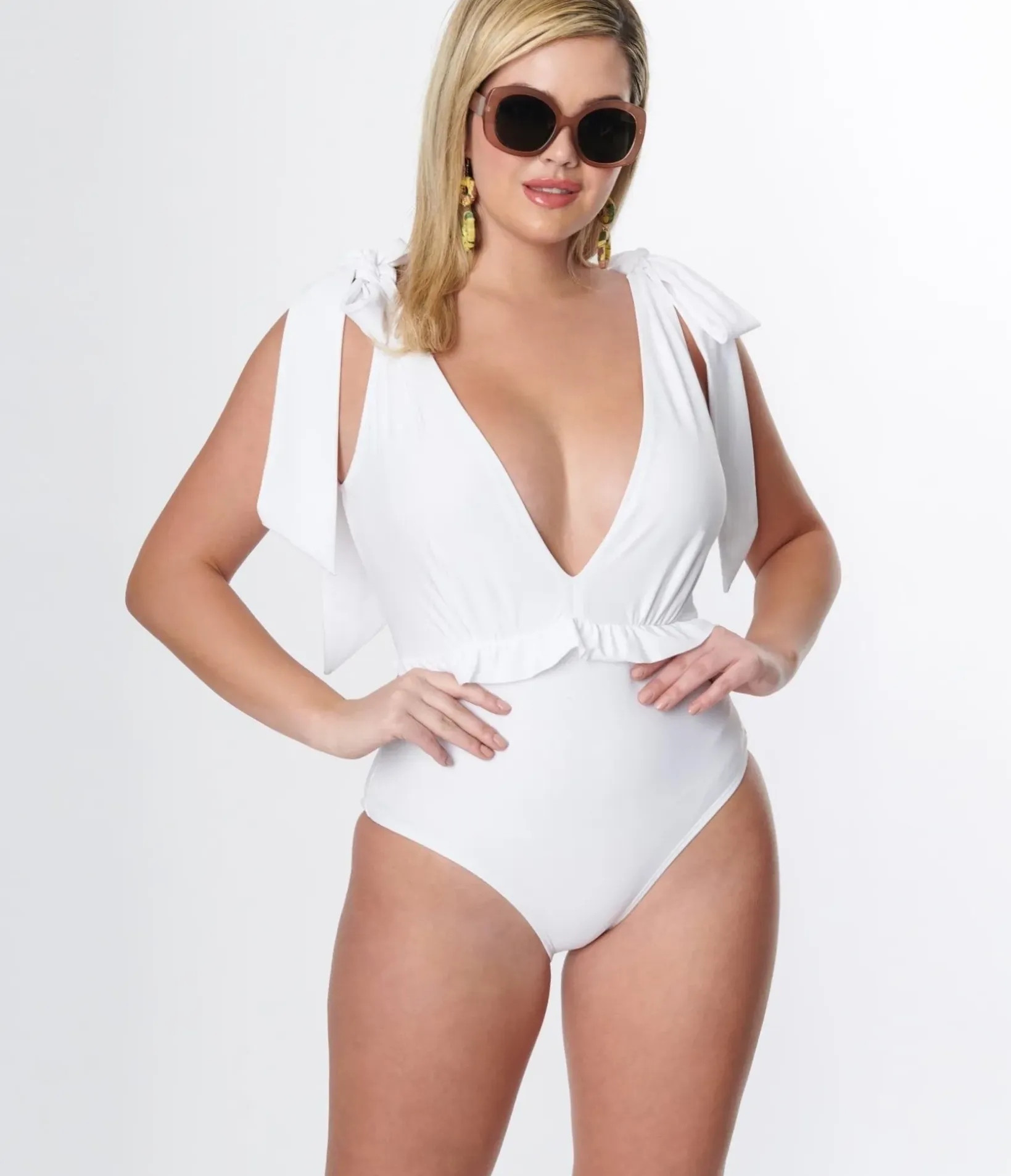 Unique Vintage One Piece Swim>White Plunge One Piece Swimsuit
